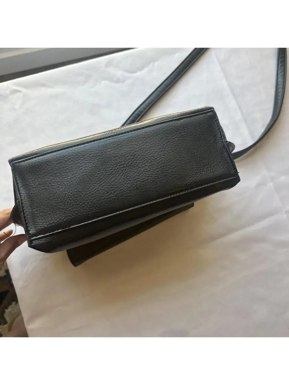 Black Faux Leather Shoulder Bag with Metal Accent and Patterned Interior